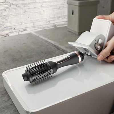 فرشاة مجفف شعر متعددة الوظائف بجهد مزدوج مع أسطوانة بيضاوية لسهولة التصفيف